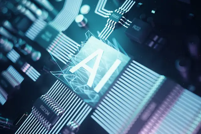 Circuit board chip with the letters AI lit up in the center and glowing traces in light blue tones