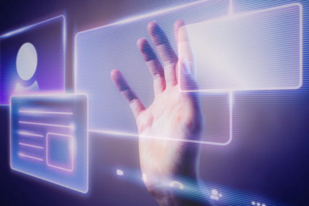 Hand touching translucent interface panels lit in violet, an image of how people interact with intelligent systems.